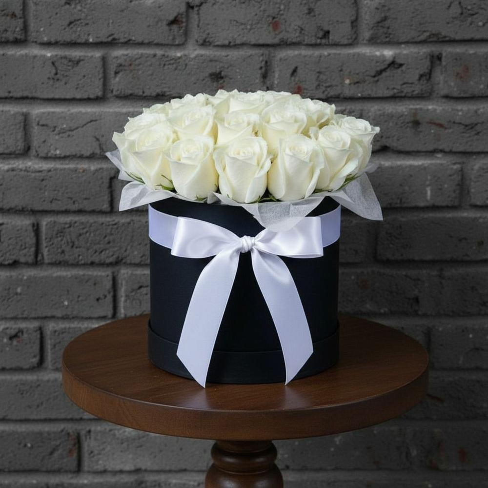 Цветочная композиция из Розы в шляпной коробке в Палласовке